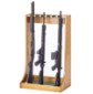 Two Rifles and one Shotgun displayed on a Flat Back Vertical Gun Stand 