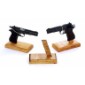 Pistols on oak pistol stands