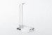 Tall clear acrylic stand in front of white background