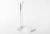 Tall clear acrylic stand in front of white background