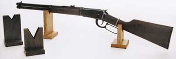 Lever-Action rifle on wooden stands