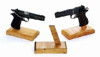 Pistols on oak pistol stands