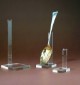 Metal spoon on acrylic stand