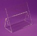 Clear acrylic mount in front of purple background