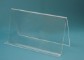 Clear acrylic mount in front of light blue background