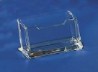 A clear acrylic display mount in front of a blue background
