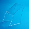 A clear plastic display mount in front of a light blue background