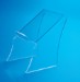 A clear plastic display mount in front of a light blue background