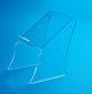 A clear plastic display mount in front of a light blue background