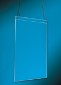 Hanging acrylic frame in front of a blue background