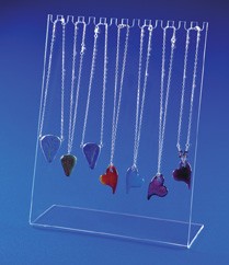 Acrylic mount with multi-colored necklaces displayed on it