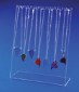 Acrylic mount with multi-colored necklaces displayed on it